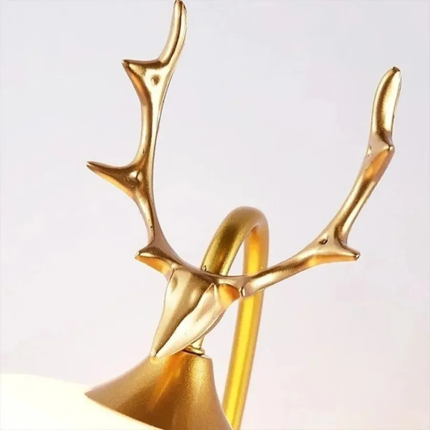 Applique murale cerf or détails